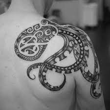 Awesome tribal octopus tattoo design by mau. Cool Black Ink Tribal Octopus Tattoo On Right Back Shoulder Octopus Tattoo Design Octopus Tattoos Tattoos