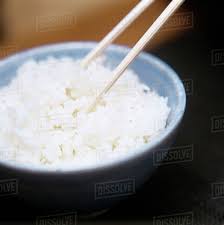 Somehow i managed to go almost six months living in japan without realizing any of this. A Bowl Of Cooked White Rice With Chopsticks Stock Photo Dissolve