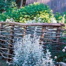 Unlike a lot of other trellis fences that are simply screwed or nailed to an existing fence, l've decided to go for a freestanding version made from reclaimed hardwood ceiling joists and wire mesh supported by high. Make Simple Beautiful Garden Fences And Trellises Mother Earth News