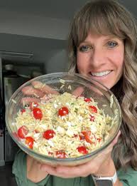 You'll LOVE this simple pasta salad with orzo!  https://www.tastesoflizzyt.com/tomato-orzo-salad-with-feta-recipe/