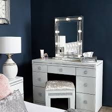 The light will normally come from either a number of led lights inside a translucent frame around the mirror, or a series of small, visible led bulbs mounted on the mirror itself. Diamond Glitz Dressing Table Mirror With 9 Dimmable Led Light Bulbs Picture Perfect Home