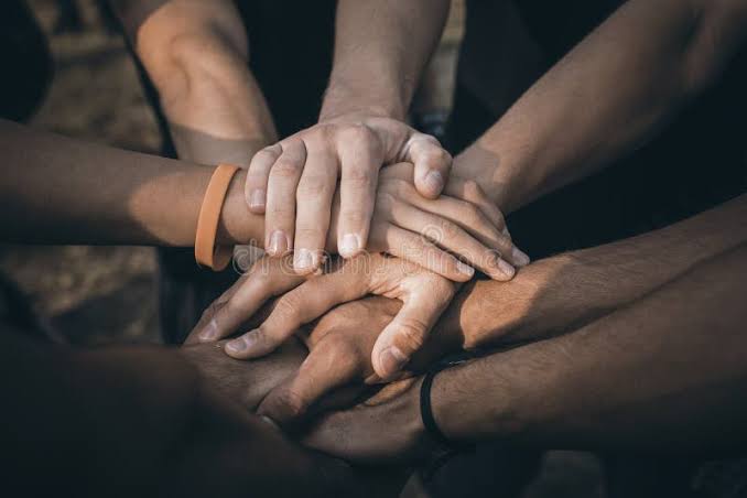 Hands joined in support