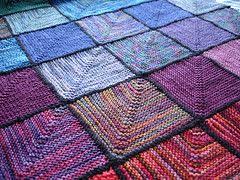 The first square cast on becomes one of the four corners of the afghan where four more squares are picked up and knit one after another. The World S Best Photos Of Mitred Flickr Hive Mind Knitted Blanket Squares Knitted Blankets Sock Yarn Blanket