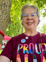 I took my kids to a local Youth Pride event last month and entered a raffle  run by the Parasol Patrol. I still can't believe I won this beautiful  heart-shaped, rainbow parasol (