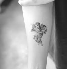 100 Angel Tattoo Ideas For Men And Women Angel Angeltattoo Ideas Men Tattoo Women Angel Tattoo Designs Baby Tattoo Designs Cupid Tattoo