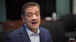 Tops President John Persons