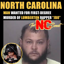 Blogged By: Gerald Jackson @iiamgj A North Carolina man is wanted for  murder 31 days after allegedly killing 20-year-old Lumberton rapper “JBo”,  whose real name is Tazarie Butler. On Friday, the Robeson