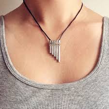 Pin By Bibi On Cute Peter Pan Jewelry Peter Pan Necklace Pan Flute