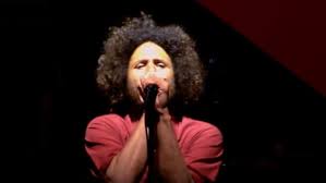 On rage against the machine's first album, the cover is a pulitzer prize winning photo of a burning monk. Rage Against The Machine Will Never Play A Drive In Concert Says Tim Commerford Blabbermouth Net