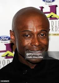 Walter Grier and Fola Grier of Grier Cargroom arrives at the ninth... News  Photo