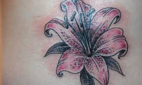 Tigers are solitary animals, and are masters of the sneak attack; 59 Beautiful Tiger Lily Tattoos Ideas