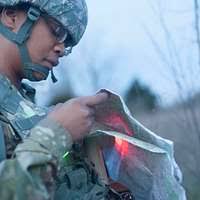 US Air Force (USAF) MASTER Sergeant (MSGT) Shawn Williams, Terminal Attack  Controller, Detachment 1, 1ST Air Support Operation Squadron (ASOS), 4th  Air Support Operations Group (ASOG), checks grid references