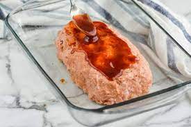 A firm and flavorful turkey meatloaf with sauteed onion, garlic, and mix of bbq sauce and ketchup! Turkey Meatloaf Simple Joy