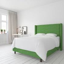 The soft velvet with a beautiful luster adds a luxurious feel. Green Beds Joss Main