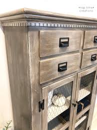 Faux wood painting is a beautiful look that can add luxury homes at no cost. Faux Barn Wood Cabinet General Finishes Design Center