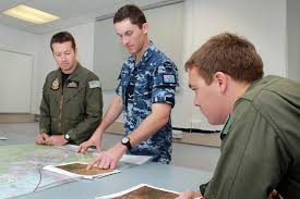 No 87 Squadron Air Intelligence Analysts Leading Aircraftman Jackson Purtle Centre Briefs No Flight Lieutenant Train Activities Royal Australian Air Force