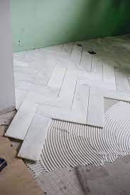 I'll leave you with a nice little pinnable graphic with. Try This Herringbone Marble Tile A Beautiful Mess