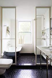 By keeping the walls and the vanity simple and neutral, the designer is able to experiment with the shower and floor tiles and create a load of visual interest with this starburst pattern. 46 Bathroom Design Ideas To Inspire Your Next Renovation Architectural Digest