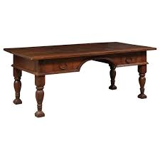 Many times hobbyists and woodworkers will build benches for their dining area in lieu of a full set of chairs. Large Brazilian Peroba Wood Executive Desk With Robustly Carved Baluster Legs For Sale At 1stdibs