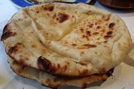 Peshwari Naan Recipe How To Make Peshwari Naan Naan Recipe Peshwari Naan Recipe Recipes With Naan Bread