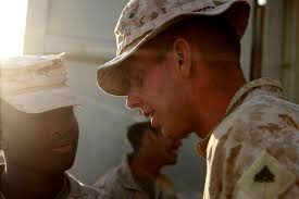 Cpl. Benjamin Leo, (right), speaks with Lance Cpl.
