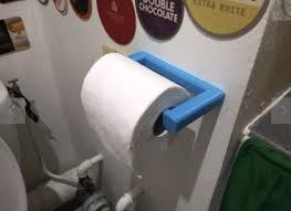 I have seen too many toilet roll holders pulled off of drywall to ever hang one that has even a chance of failing. Design Of The Week Minimalist Quick Change Toilet Paper Holder Fabbaloo