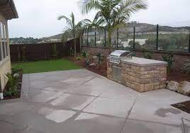 Outdoor kitchen should work with your home's style. Small Budget Friendly Outdoor Kitchens Landscaping Network
