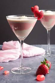 Combine the strawberry liquid and the cream mixture. Strawberries Cream Mudslide Recipe Amanda S Cookin Cocktails