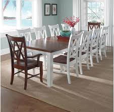 It has three 18 inch leaves and a maximum length. The Ten Foot Extension Dining Table Is Custom Finished