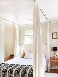Diy bed canopy with lights. How To Hang A Canopy From The Ceiling Without Drilling Holes Hunker Canopy Bed Diy Curtains Around Bed Ceiling Bed