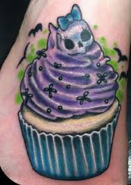 The tempting cupcakes look so delicious and attractive that one the cupcake tattoo can be done in the breast area, ankle area, leg area as well as the hand area. Evil Cupcake Tattoo By Bittersweetluna Cupcake Tattoos Cupcake Tattoo Designs Evil Tattoos
