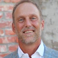 New office update #2! After we learned the home's early 1900's build date,  we just KNEW there might be some details hiding under the vinyl siding. The  photo below of early downtown