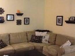 The white marble rimmed shades call back to the solid. Need Lighting Ideas For Sectional Couch