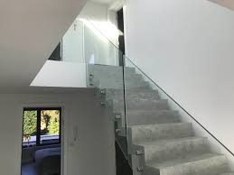 Oak stairs with glass balustrade and modern space saving feature treads. Glass Balustrades Glass Banisters Stairs Stevenage Glass