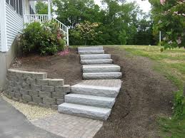 Tamp the dirt down to keep the base stones from shifting. Walkway Retaining Wall Granite Steps And Brick Headwall Kingston Nh Labrie Property Maintenance And Landscaping