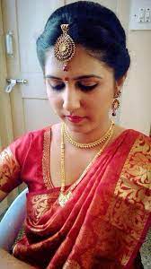 Indian Bride S Reception Hairstyle Created By Swank Studio Indian Bride Hairstyle Indian Bridal Hairstyles South Indian Bride Hairstyle