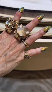 major Cartier side-eye when I said this looked like a fish, but frankly I  was obsessed with the rainbow fish as a child 🐠 Cartier's 'Nectar'  high-jewelry watch unites inspiration from nature