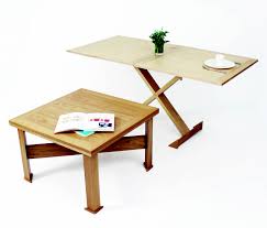 I myself had an idea to take a flip top sewing machine table, cut the legs down (just a little) and turn it into a night stand! Coffee Table To Dining Table Convertable Classic By Griffin And Sinclair Notonthehighstreet Com