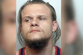 Face of dangerous man who slashed ex-partner with Stanley knife while she  slept