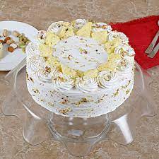 Order now from cake spot. Buy Send Vanilla Flavored Pista Rasmalai Cake 1 Kg Online Ferns N Petals