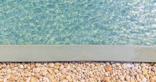 Still really popular, cracked pea gravel can be used as a decorative mulch, as a driveway or an informal pathway. Pea Gravel Pool Deck Design Guide Designing Idea