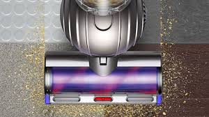 Dyson Light Ball Vacuum Cleaner Picking Up Debris On Hard Floor And Carpet Ball Lights Clean Dyson Vacuum Upright Vacuums