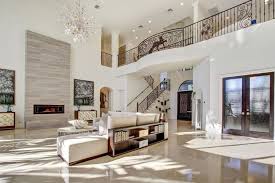20 Living Room Ideas With With High Ceilings Housely High Ceiling Living Room Chandelier In Living Room Beautiful Living Rooms