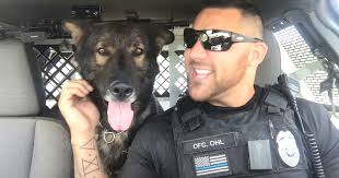 Police Dog Steals Spotlight From Police Officer's Lip Sync