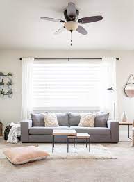 Create more room by hollowing out furniture. Minimalist Living Room Decor Makeover Cherished Bliss