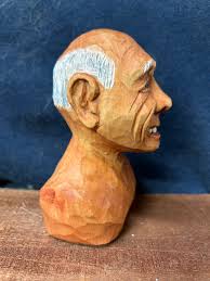 Caricature Carvings of Females