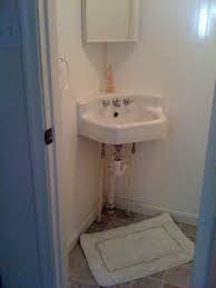 Stick one side of the velcro onto of the top hem of your sink skirt. No Sew Pedestal Sink Skirt Juniper Home