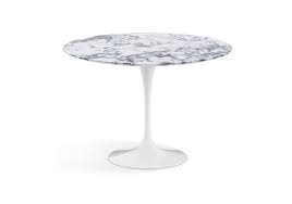 Its minimalistic stem base contrasts elegantly with its sophisticated circular top. Saarinen Round Coffee Table Marble Knoll Milia Shop