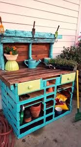 Learn how to build a potting bench from pallets, recycled lumber and an antique window with this tutorial. Diy Pallet Potting Table Easy Pallet Ideas