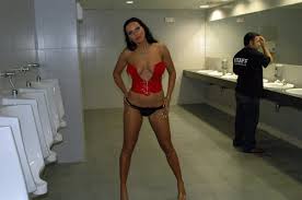 Brunette Julia P removes panties in the male toilet — Russian Sexy Girls